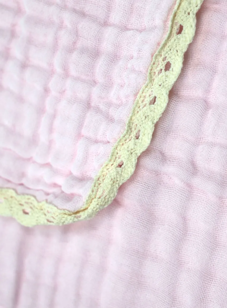 Une couverture bébé en gaze de coton douce et élégante