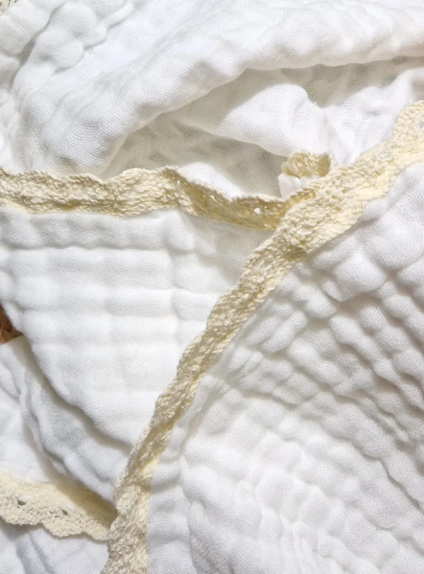 Une couverture bébé en gaze de coton douce et élégante