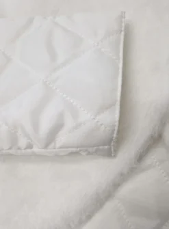 Veste enfant matelassée et fausse fourrure